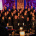 Gospelchor Lingenfeld singt auf einer beleuchteten Bühne vor Publikum